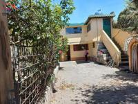 CASA CON TERRENO DE VENTA EN CAYAMBE, 1º DE MAYO