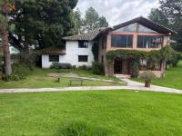 SE VENDE 17.800 M2 CON 7 CASAS EN OTAVALO, APTO PARA HOSTERÍA