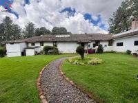SE VENDE 17.800 M2 CON 7 CASAS EN OTAVALO, APTO PARA HOSTERÍA