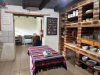 SE VENDE 17.800 M2 CON 7 CASAS EN OTAVALO, APTO PARA HOSTERÍA